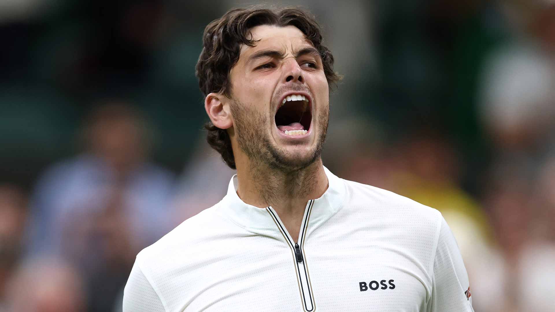 Taylor Fritz defeats Gabriel Diallo in five sets on Wednesday.