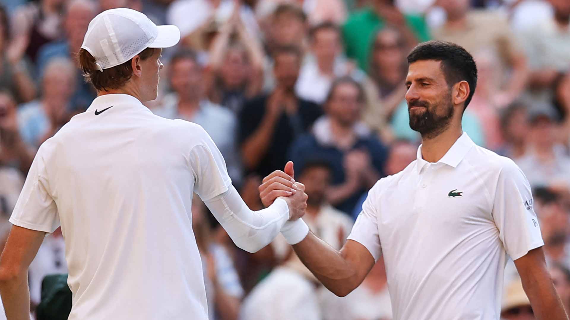 Novak Djokovic congratulates Jannik Sinner after their Wimbledon semi-final on Friday.