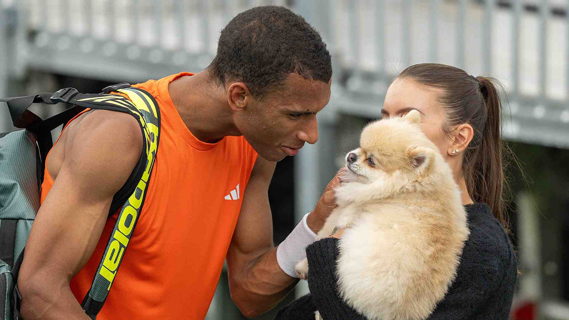 Felix Auger-Aliassime with wife Nina Ghaibi and their dog, Timmy, in Miami on Monday.
