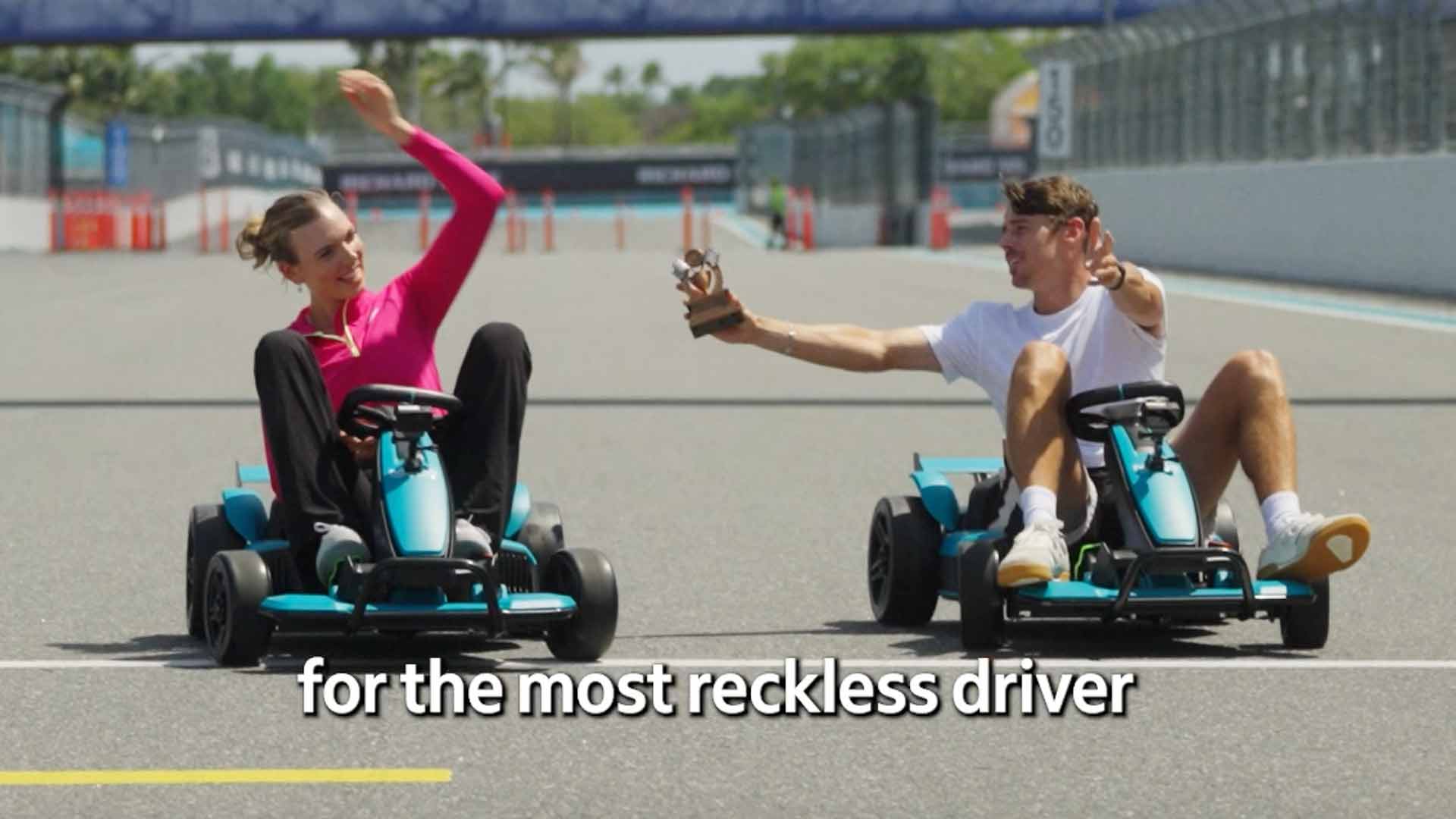 Katie Boulter and Alex de Minaur race at the Miami F1 track.