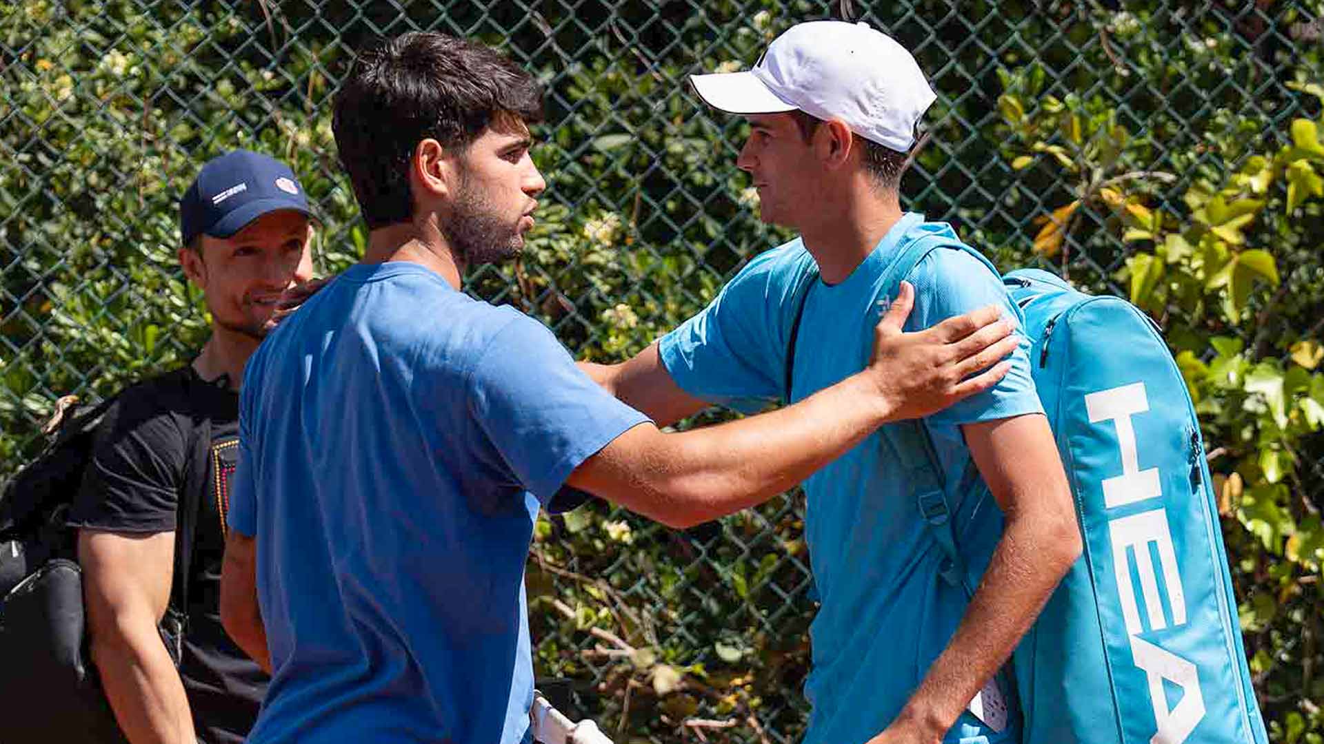 Carlos Alcaraz and Rafael Jodar on the practice court in Barcelona.