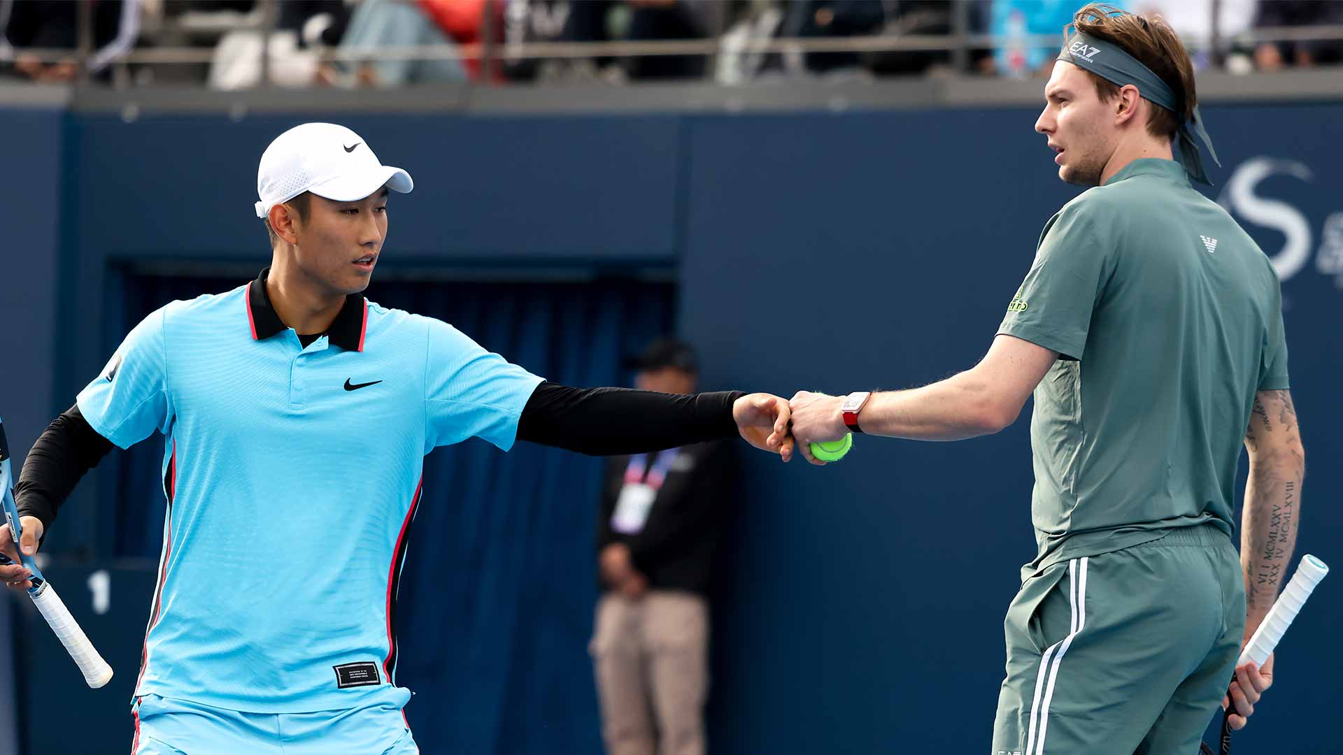 Shang Juncheng and Alexander Bublik celebrate their victory Wednesday at the China Open.